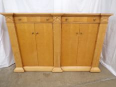 Drexel Heritage maple sideboard having baize lined drawers, one of which is for cutlery, over a four
