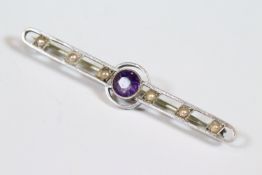 White metal bar brooch set with a central faceted amethyst flanked by six seed pearls, stamped