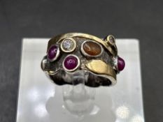 A unusual hand made silver and gold stone set ring size L 7.5 gms