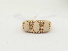 A OPAL AND DIAMOND RING 18CT GOLD SIZE N 4.5 GMS