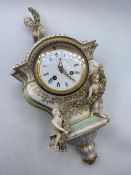 Another decorative French wall clock with cherubs 16” high