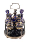 A George III old Sheffield plated five-bottle sauce bottle frame, unmarked circa 1800, circular
