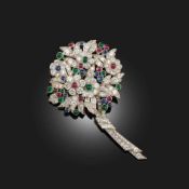 LACLOCHE FRÈRES, AN ART DECO BROOCH, designed as a bouquet of flowers set with cabochon rubies