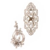 TWO DIAMOND-SET BROOCH MOUNTS, comprising; a diamond-set openwork frame brooch, of foliate design,
