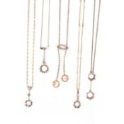 A SMALL COLLECTION OF PENDANT NECKLACE MOUNTS, comprising; a diamond pendant mount, set with