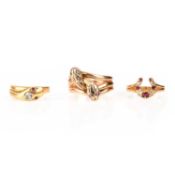 THREE GEM-SET RINGS, 19TH CENTURY AND LATER, comprising; a ruby and diamond ring, in the form of two