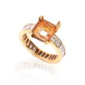 A DIAMOND-SET ETERNITY RING MOUNT, set with baguette-cut diamonds and a vacancy for an emerald-cut