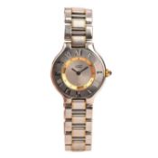 CARTIER, A LADY'S 'MUST DE CARTIER 21' WRISTWATCH, signed sunburst silvered dial with blued steel