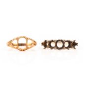 TWO 19TH CENTURY YELLOW GOLD RING MOUNTS, comprising; a pierced scrolling decorated yellow gold ring