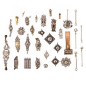 A COLLECTION OF GEM-SET CLASPS, comprising; Chaumet, a diamond clasp, set with a border graduating