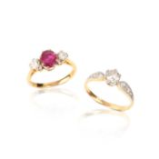 A RUBY AND DIAMOND RING AND A DIAMOND SOLITAIRE RING, comprising; a three stone ruby and diamond