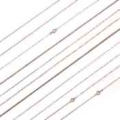 A COLLECTION OF 11 CHAINS, comprising; nine platinum fine-link chains, varying lengths, gross weight