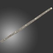 AN ART DECO NATURAL PEARL AND DIAMOND BRACELET, composed of a line of graduated collet-set