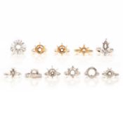 A COLLECTION OF 11 RING MOUNTS, comprising; Gérard, a diamond ring mount, set with tapering
