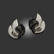 A PAIR OF ONYX AND DIAMOND EARRINGS, of stylised crescent design set with graduated circular-cut