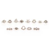 A COLLECTION OF 13 RING MOUNTS, comprising; a diamond ring mount, set with a tapering baguette-cut