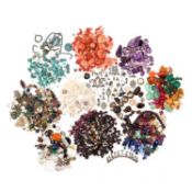 † A COLLECTION OF GEMSTONES AND JEWELLERY COMPONENTS, including: a cushion-shaped diamond weighing
