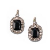 A PAIR OF BLUE PASTE AND DIAMOND EARRINGS, the circular-cut diamond suspending a cluster of blue