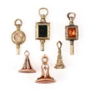THREE WATCH KEYS AND THREE SEALS, 19TH CENTURY, comprising three Regency watch keys, two set with