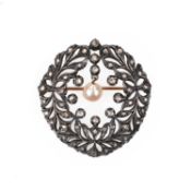 A CULTURED PEARL AND DIAMOND BROOCH, of openwork foliate design set with rose-cut diamonds and