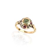 AN ENAMEL AND GEM-SET RING, designed in the Renaissance Revival style, the domed mount applied