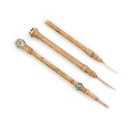 A Victorian 9-carat gold slide-action pencil, unmarked, set with turquoise decoration and with a