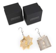 Two modern silver Christmas decorations, by Benjamin Ryan, London 2019, one of a star form with