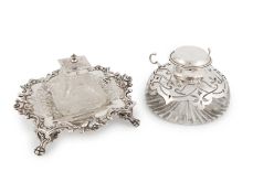 A Victorian silver inkstand, by Henry Wilkinson & Co, London 181875, square-shaped with a scroll and