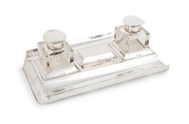 A silver inkstand, by Goldsmiths & Silversmiths Co Ltd, London 1910, rounded rectangular form, two