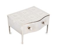 A novelty silver stamp box, by A & J Zimmerman, Birmingham 1912, modelled as a lowboy, the cover