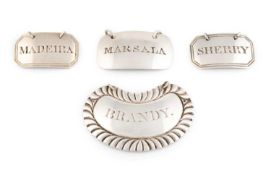 A collection of four provincial silver wine labels, comprising: a pair by Barber, Cattle and