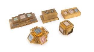 A collection of gilt metalware stamp boxes, unmarked, one rectangular form with engraved scroll