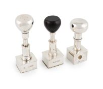 Three Edwardian silver stamp stampers, two by William Hornby, London 1902 and 1903, and one by