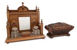 A Victorian oak stamp box, unmarked, circa 1880, tapering rectangular form, scroll edges, carved '