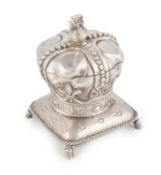 A novelty Edwardian silver inkwell, by Thomas Ducrow, Birmingham 1901, modelled as a crown on a