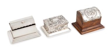A small Edwardian silver stamp box, by William Neale, Chester 1902, raised rectangular form with a