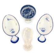 A pair of Derby blue and white caddy spoons, unmarked circa 1780, oval form, decorated with floral