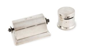 Two Edwardian silver stamp dispensers, by Charles & George Asprey, London 1902 and 1904, one of