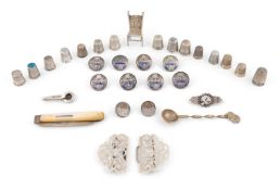A mixed lot of small silver vertu items, comprising: an Edwardian silver belt buckle by Adie &