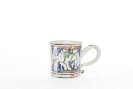 A DELFTWARE COFFEE CAN LONDON, C.1760-80 polychrome painted with stylised foliage in green, red