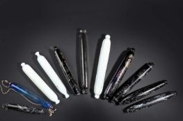 A COLLECTION OF ELEVEN GLASS ROLLING PINS MAINLY 19TH CENTURY comprising: three Nailsea speckled