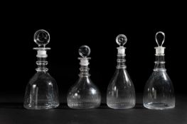 FOUR GLASS DECANTERS AND STOPPERS 19TH CENTURY each of three ring-necked mallet form, to include two