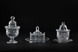 A GEORGE III CUT GLASS BUTTER DISH, COVER AND STAND LATE 18TH CENTURY of oval form, with faceted and