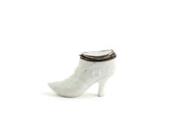 A MENNECY WHITE-GLAZED SHOE-SHAPED BONBONNIERE C.1740-50 with a silver-gilt mounted hinged lid,