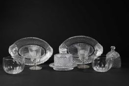 A PAIR OF CUT GLASS DISHES C.1800 of oval form, with lozenge and fan decoration, together with a