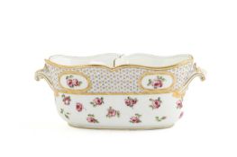 A SEVRES SEAU A LIQUER DATE CODE FOR 1769 the oval body painted with rose sprigs beneath a border of