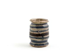 A DELFTWARE OINTMENT POT LONDON, C.1640 of albarello form, with blue and manganese banded decoration