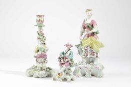 AN ENGLISH PORCELAIN FIGURE OF A VINTNER POSSIBLY CHELSEA-DERBY, LATE 18TH CENTURY modelled seated