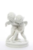 A SEVRES BISQUE GROUP AFTER FALCONET OR PIGALLE, MID-19TH CENTURY modelled as two cherubs fighting