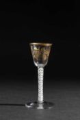 A GILT DECORATED WINE GLASS PROBABLY FROM THE JAMES GILES ATELIER, C.1760-70 decorated with fruiting